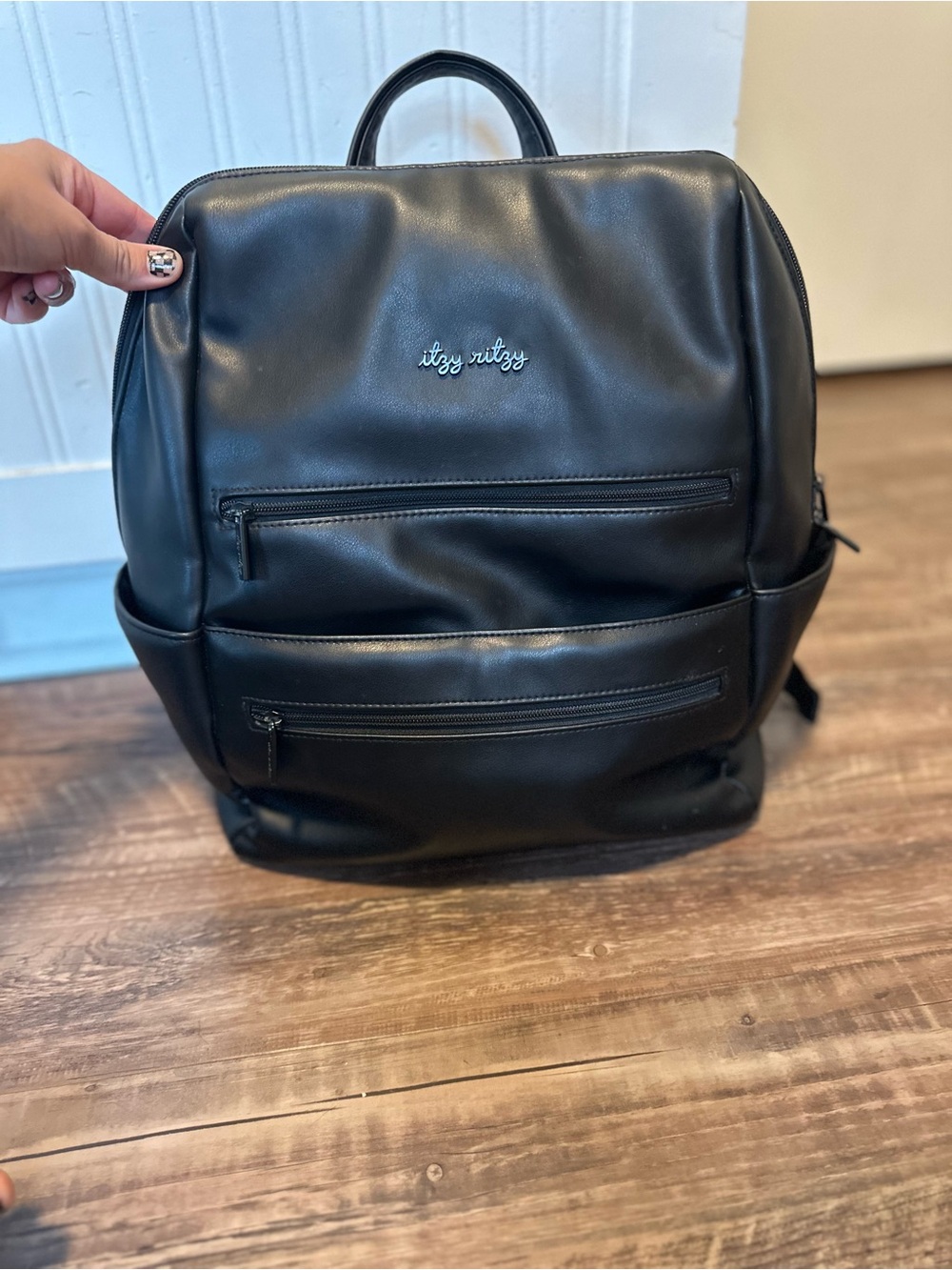 Itzy Ritzy Era Black Faux Leather Backpack with Front Zip Pockets